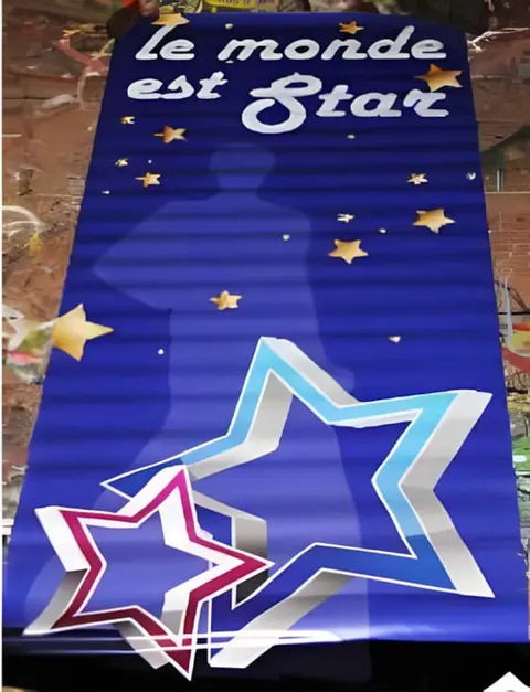 Bâche "Le monde est Star"
