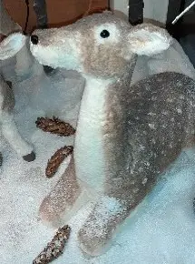 Biche couchée en fourrure
