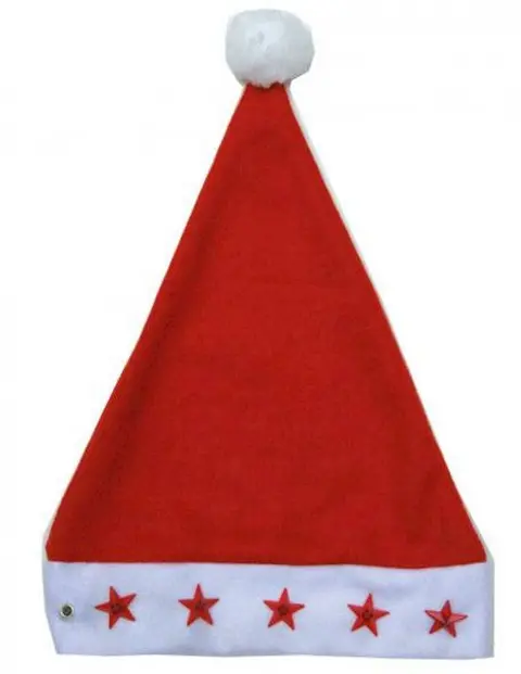 Bonnet de Noël rouge à étoiles sur le revers